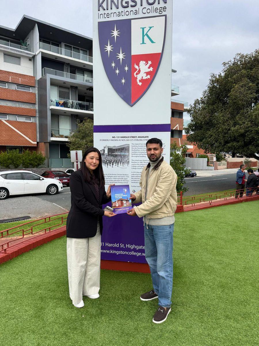 Fourway Global Advisory receiving the Kingston International College 2026 prospectus from a college representative at the Highgate campus.